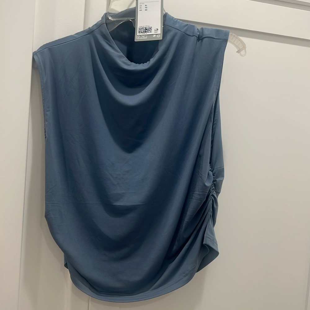 Sleeveless mock turtle neck shirt